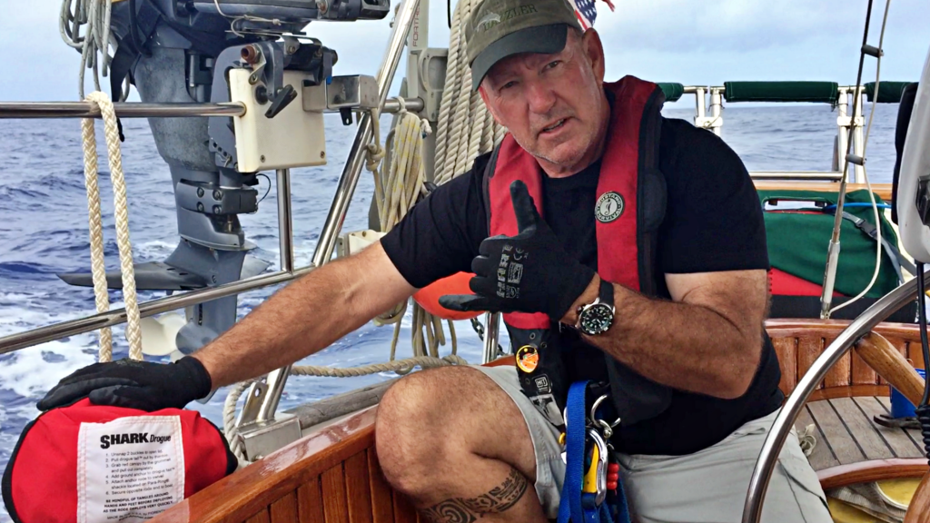 Captain Dan shows the Shark Drogue we have on board for extreme weather conditions.