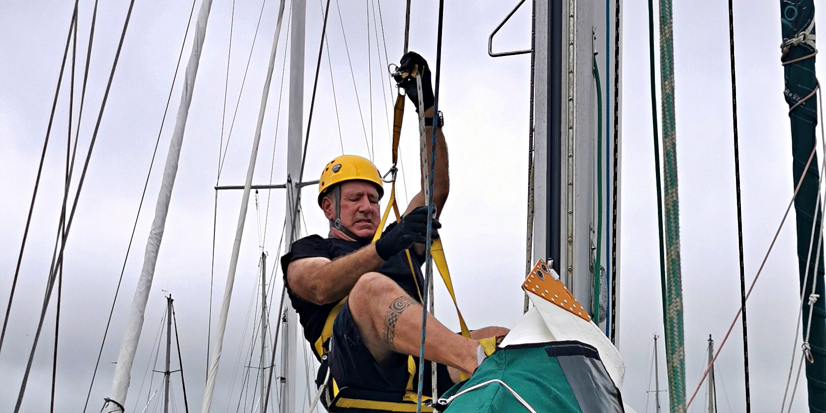 Dan getting ready to go up the mast.