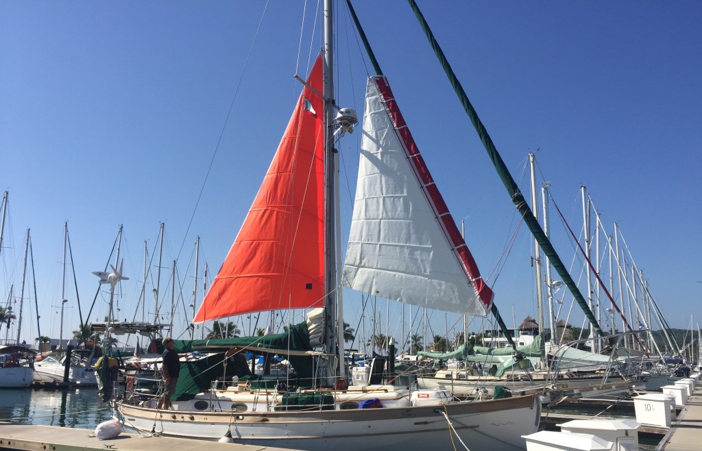 Dazzler's storm sails are deployed and being checked.